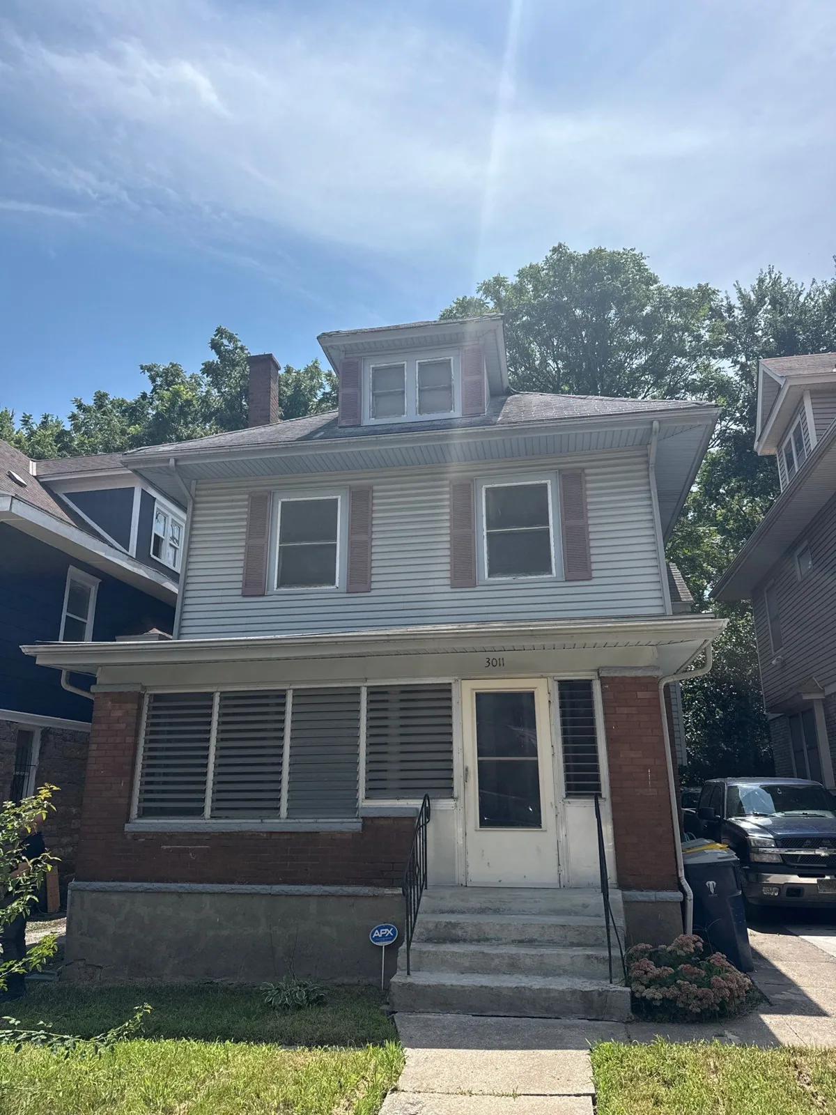 E. 32nd Street home before roof replacement